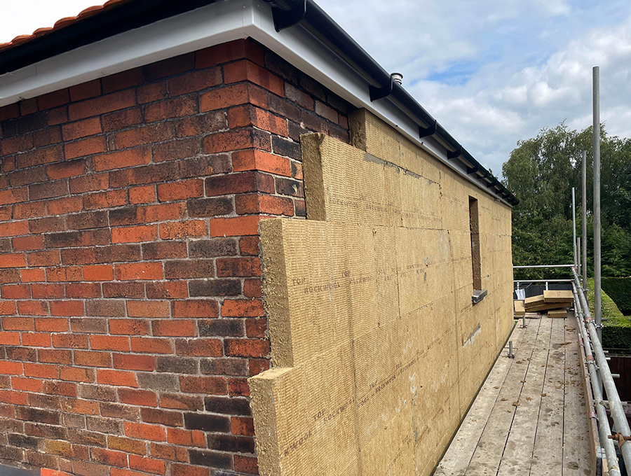 Building with external wall insulation applied