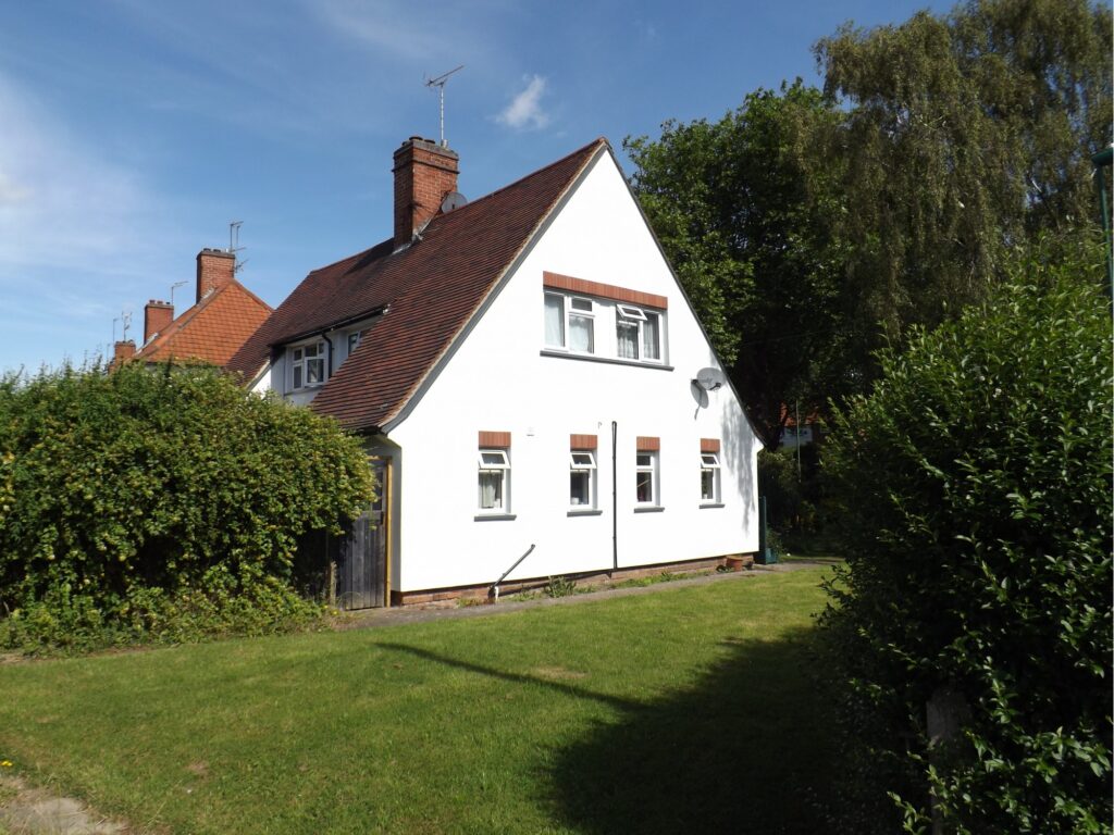 House with white external wall insulation