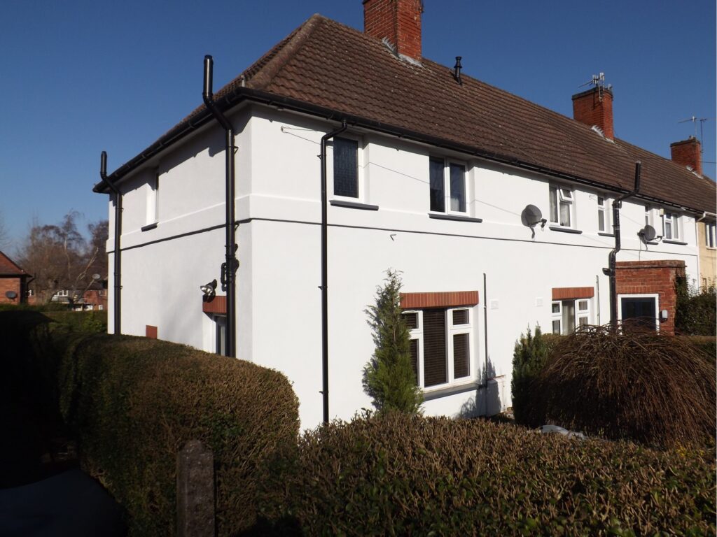 House with white House with white external wall insulation 2